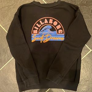 Black sweater with writing on back. Size Large